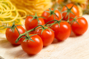 close-up of cherry tomatoes and pasta