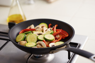 Preparing vegetables in a pan