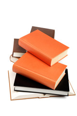 A stack of books on a white background.