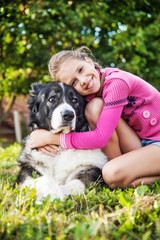 Little girl with dog 