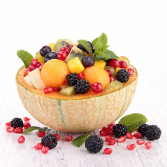 fruit salad with melon,blackberries,pomegranate and mango