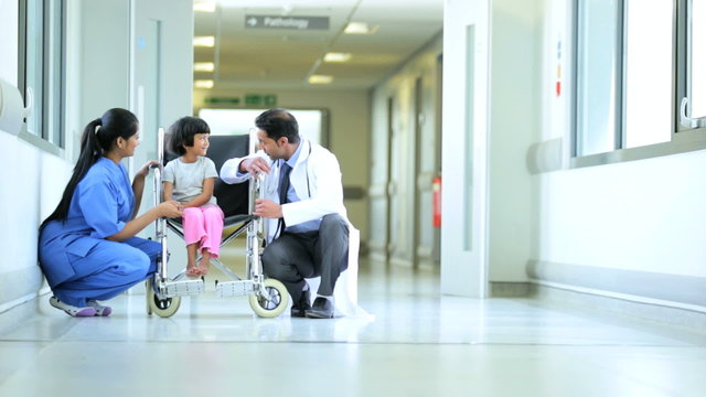 Pediatrician Little Asian Indian Girl Wheelchair Hospital Corridor