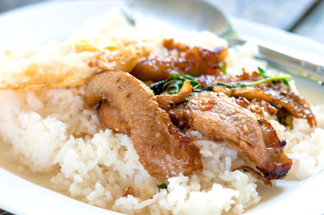 Rice with stir fried hot and spicy pork with basil