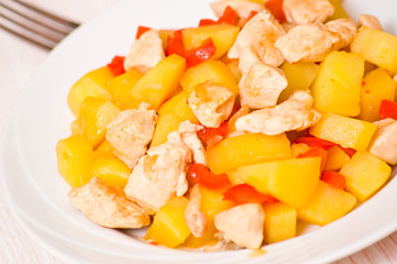 chicken breast with potatoes and peppers