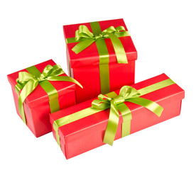 Isolated Christmas gift box with green ribbon.