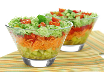 Tasty salad with fresh vegetables, isolated on white