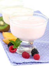 Delicious yogurt with fruit and berries close-up