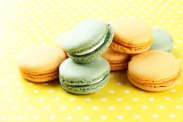 Gentle macaroons on table close-up