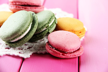 Gentle macaroons on table close-up