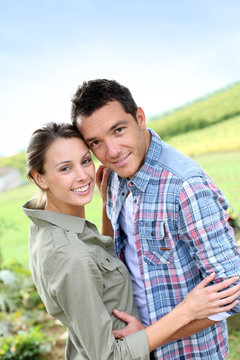 Portrait of sweet couple in countryside