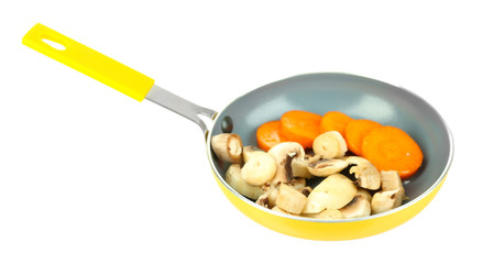 Sliced fresh vegetables in pan isolated on white