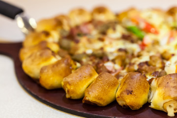 Pizza with sausage close up