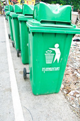 Green Plastic Waste Container In The Park