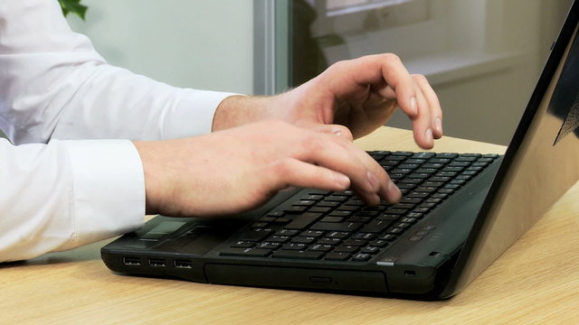 Close Up Hands Caucasian Male Using Laptop Keyboard