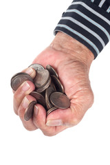 Elderly hand full of United States coins isolated on white