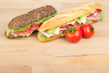 Fresh sandwiches with meat and vegetables and tomatoes