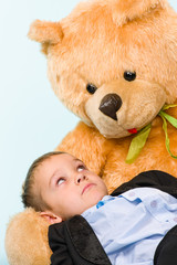 Little boy and teddy bear