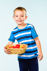 Boy and fruit basket