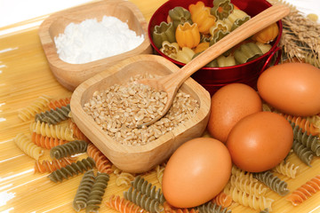 Fototapeta na wymiar Grains of Wheat with pasta and food ingredient
