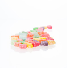 Colorful soft jellies candy over white background