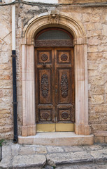 Wooden door. Conversano. Puglia. Italy.
