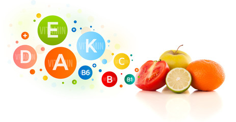 Healthy fruits with colorful vitamin symbols and icons