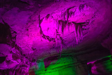 Sataplia cave in Georgia lit by different colors