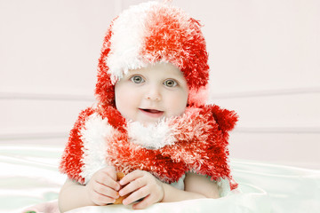 Cute baby at winter background