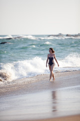Woman takes rest at the sea shore