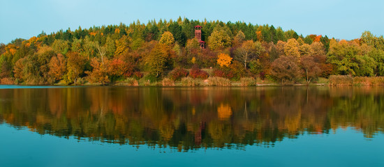 Autumn landscape with a reflection in the lake