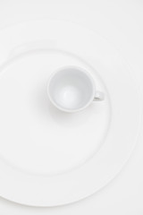 Obraz na płótnie Canvas White plate and cup