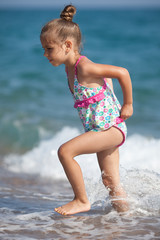 Little five year old girl at the beach