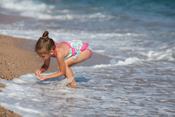 Little girl at the beach