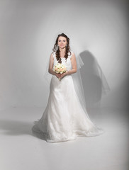 Fototapeta premium Beautiful bride posing in studio