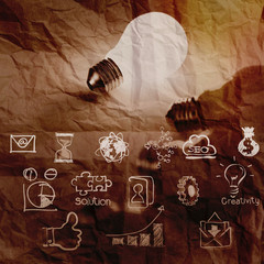 light bulb 3d on business strategy on crumpled paper background