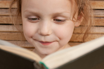 child reading a book