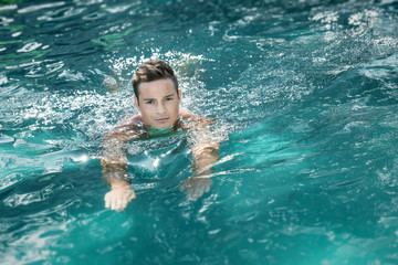 young man swimming