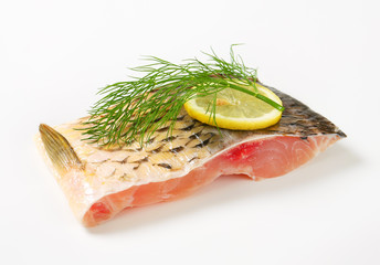Raw carp fillet