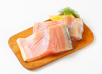 Raw carp fillets