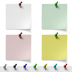 Pieces of paper pinned pushpin