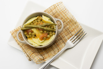 Italian filled pasta with asparagus and peas
