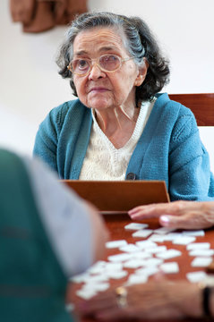 Senior people playing rummy
