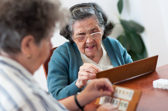 Senior people playing rummy