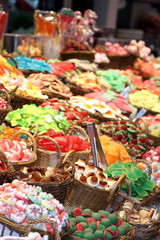 Candies sweets in La Boqueria food market in Barcelona Catalonia
