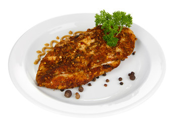 Roasted chicken fillets on white plate, isolated on white