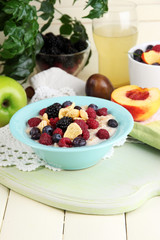 Oatmeal in plate with berries