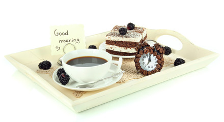 Cup of tea with cakes on wooden tray isolated on white
