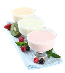 Delicious yogurt with fruit and  berries isolated on white