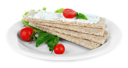 Tasty crispbreads with vegetables, isolated on white