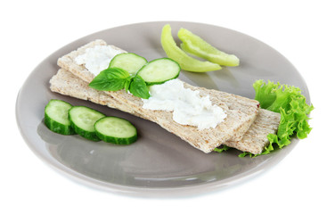 Tasty crispbreads with vegetables, isolated on white